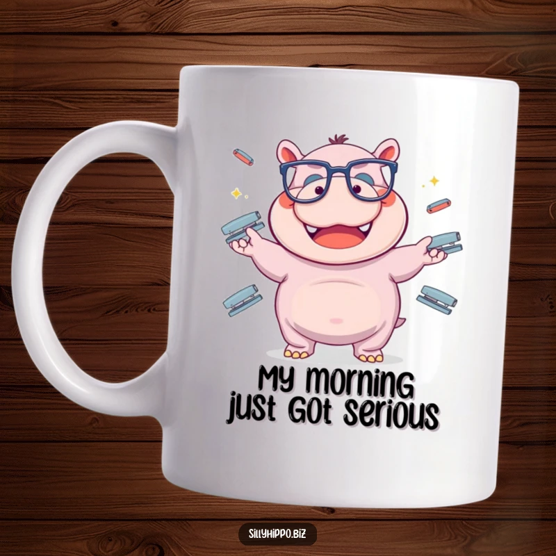 Funny hippo wearing giant glasses hilariously juggles office staplers, bringing laughs to this coffee mug design.