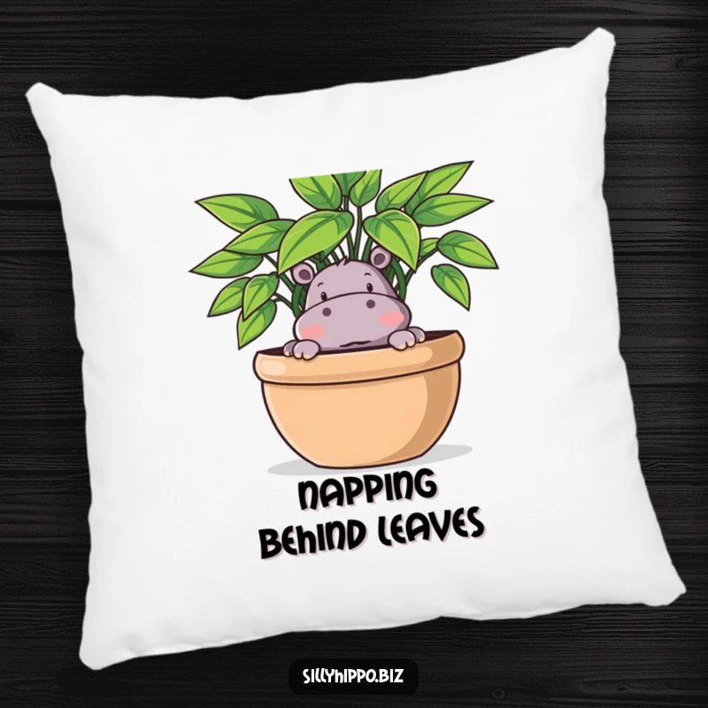Funny Pillow featuring a playful hippo peeking out from behind a large potted plant, looking cute and curious.