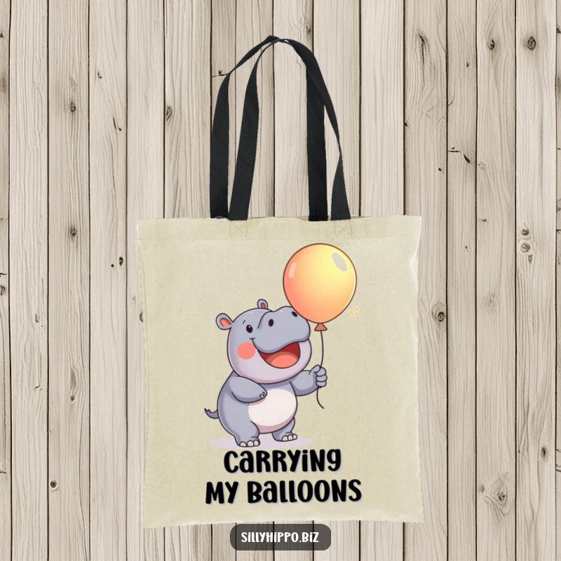 Funny Tote Bag with a happy hippo enthusiastically inflating a big, colorful balloon, embodying pure delight.